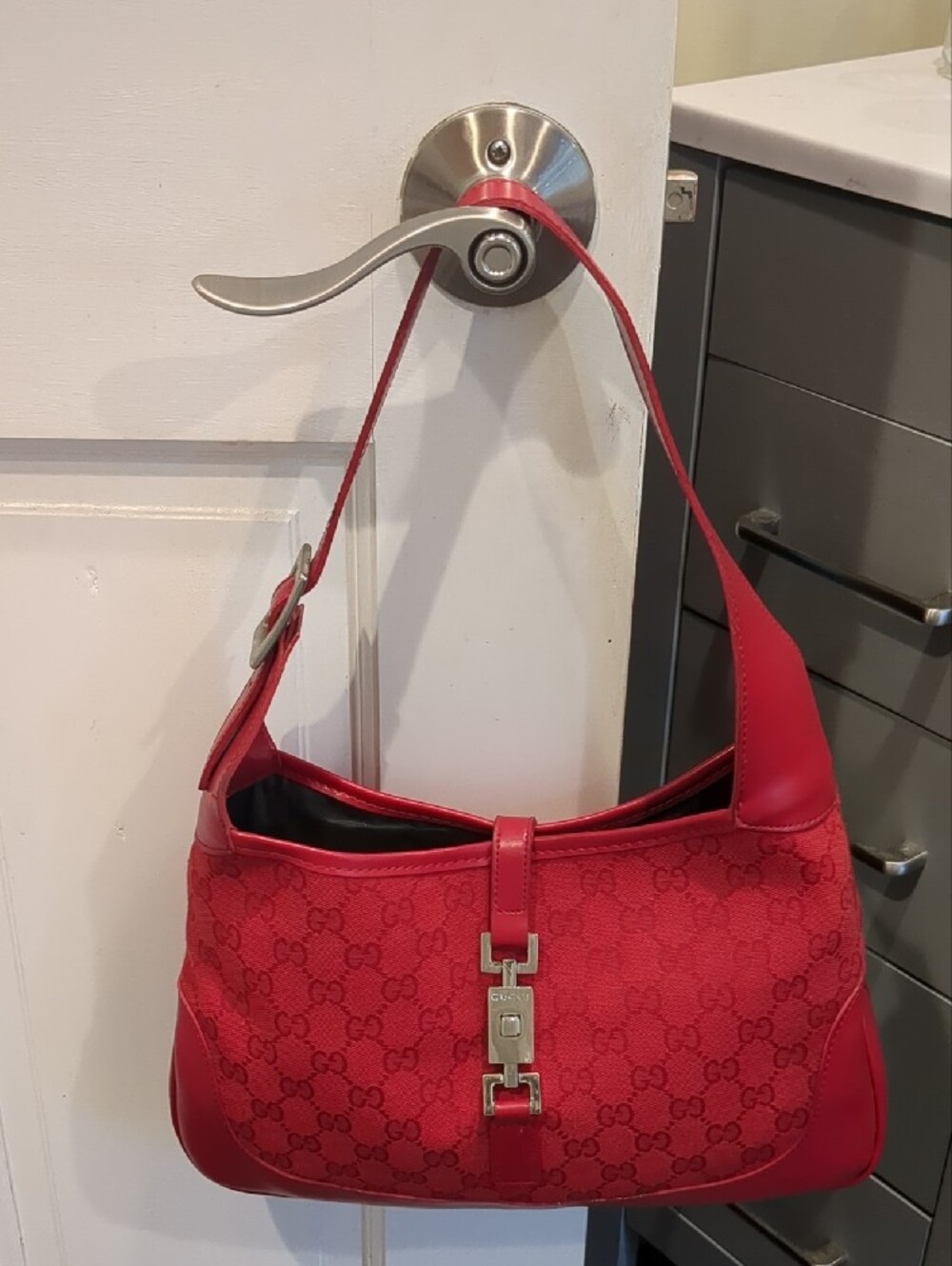 Gucci Jackie Red Shoulder Bag with Secure Silver Piston Lock